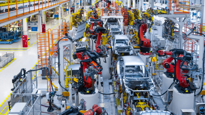 Automotive production line. Welding car body. Modern car Assembly plant Which Jobs Will Be Replaced by AI in 2030?