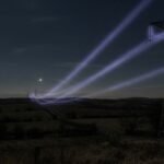 Violet Glow on High Voltage Lines: What Corona Means